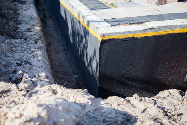 Residential Interior Drainage System installation at a Williamsburg, VA home by SJ Waterproofing Pros